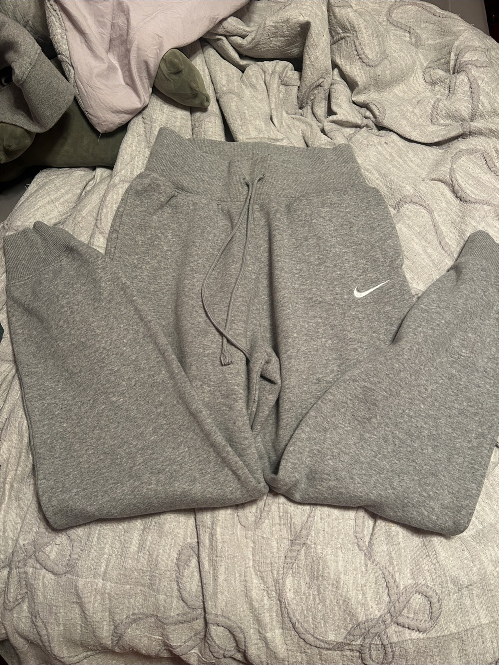 Nike women’s Gray Heather Fleece Joggers with Swoosh